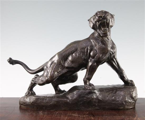 Thomas Cartier (French, 1879-1943). A patinated bronze model of a lion, Lionne Rugissant, 16.5in.